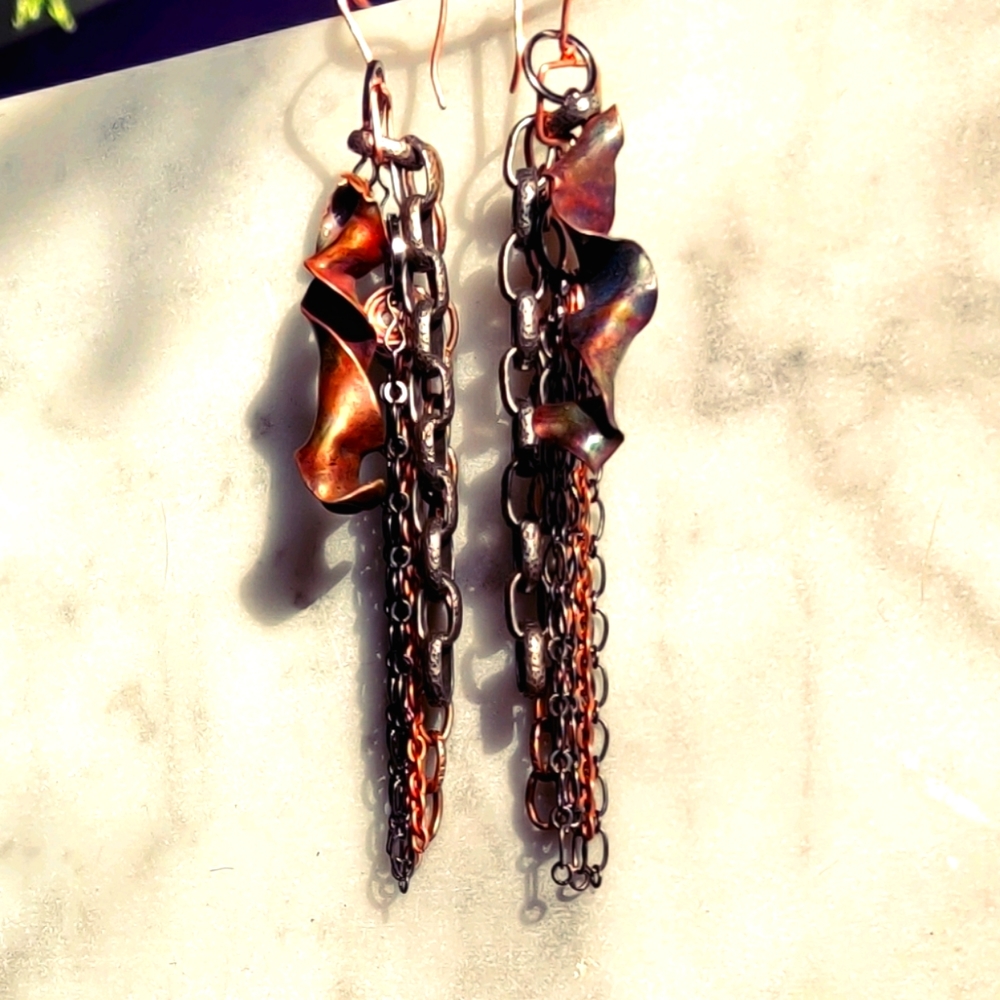 Flame painted copper and chain earrings.